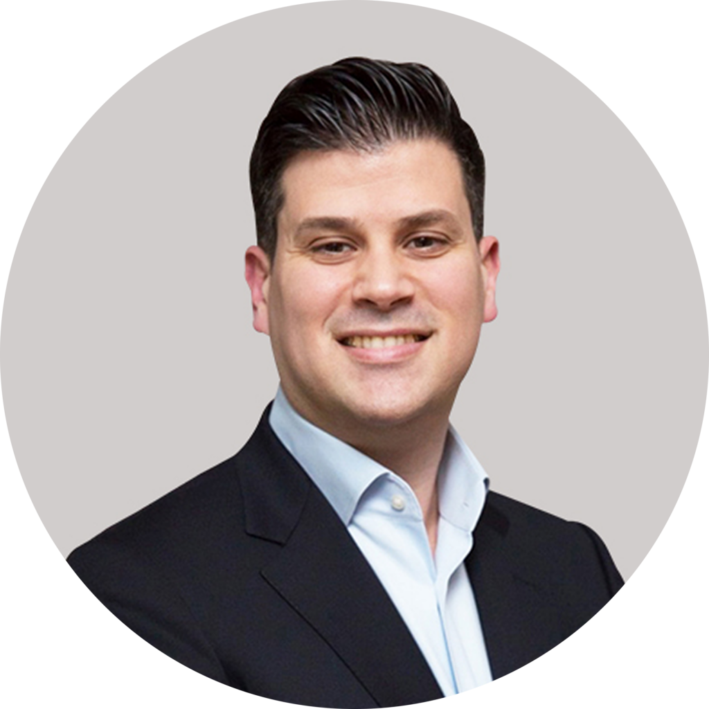 Dr John Maggirias round